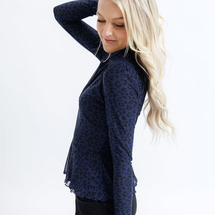 Peplum Turtleneck Top