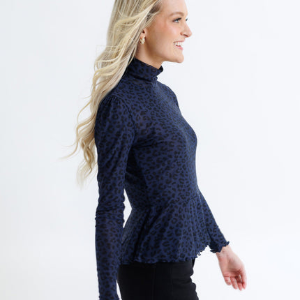 Peplum Turtleneck Top