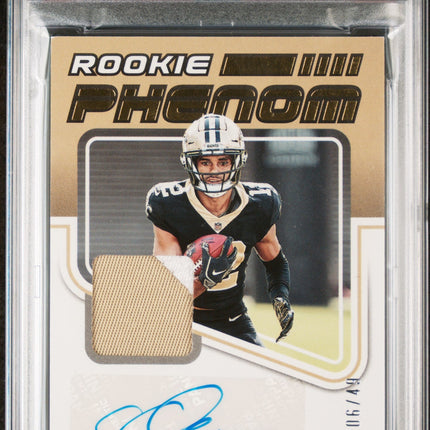 Chris Olave 2022 Panini Donruss Rookie Phenom Jersey Autographs Prime PSA 8