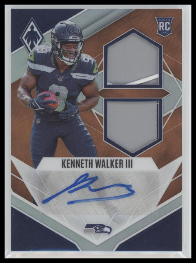 2022 Panini Rookie Auto Dual Jersey Orange Kenneth Walker III #/125 Auto #RAD-KW