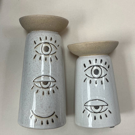 2-Piece Ceramic Candle Holders w/ Eyes