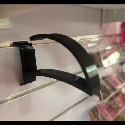 Slat wall hat hanger