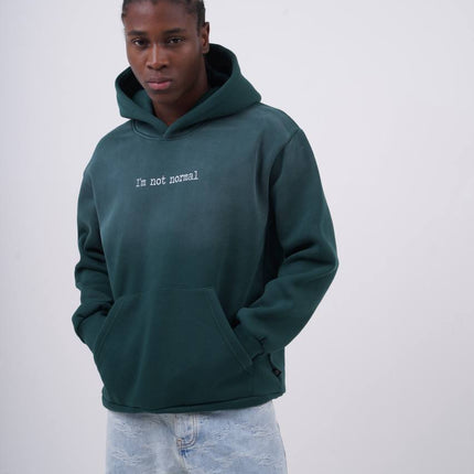 "I'm Not Normal" Graphic Hoodie