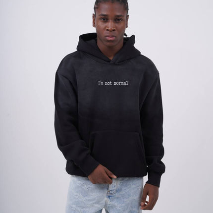 "I'm Not Normal" Graphic Hoodie