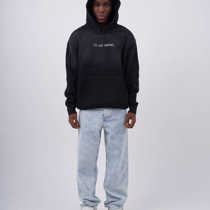 "I'm Not Normal" Graphic Hoodie