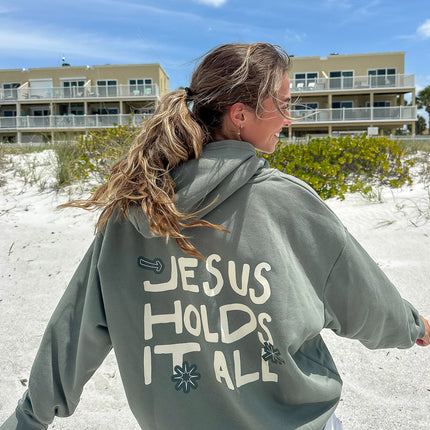 Jesus Holds It All Unisex Hoodie