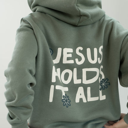 Jesus Holds It All Unisex Hoodie