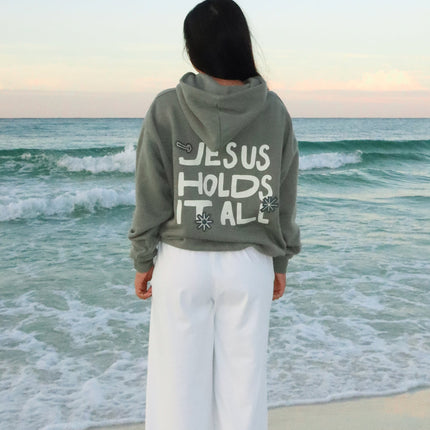Jesus Holds It All Unisex Hoodie