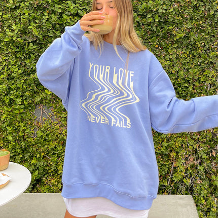 Love Never Fails Blue Unisex Crewneck