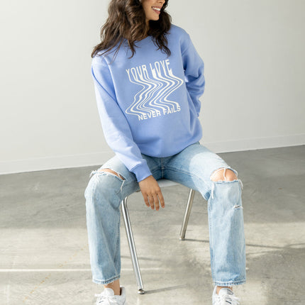 Love Never Fails Blue Unisex Crewneck