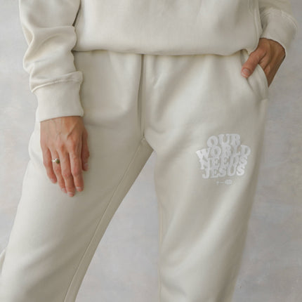 Our World Needs Jesus Beige Unisex Sweatpant