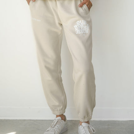 Our World Needs Jesus Beige Unisex Sweatpant