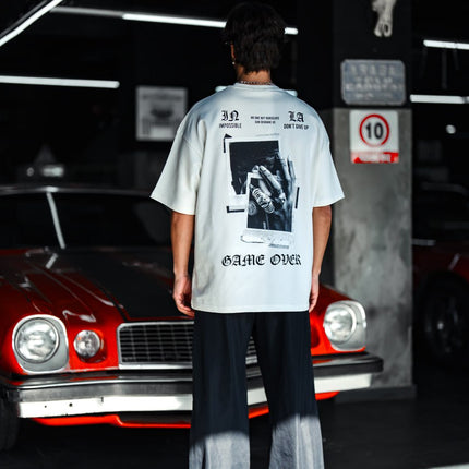 Oversize Graphic Cotton Tee – Impossible Game Over Print