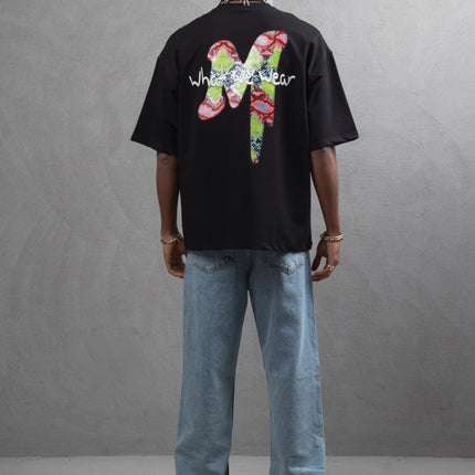 Oversize Graphic Cotton Tee – "What We Wear" Abstract Print