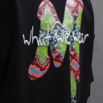 Oversize Graphic Cotton Tee – "What We Wear" Abstract Print