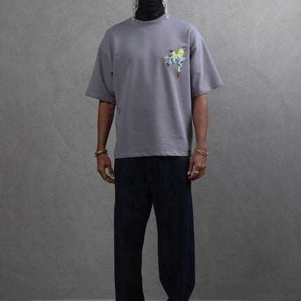 Oversize Graphic Cotton Tee – "What We Wear" Abstract Print