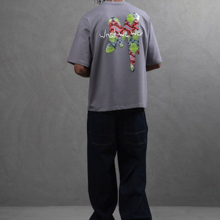 Oversize Graphic Cotton Tee – "What We Wear" Abstract Print