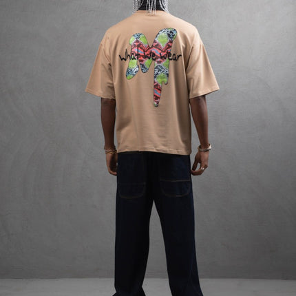 Oversize Graphic Cotton Tee – "What We Wear" Abstract Print