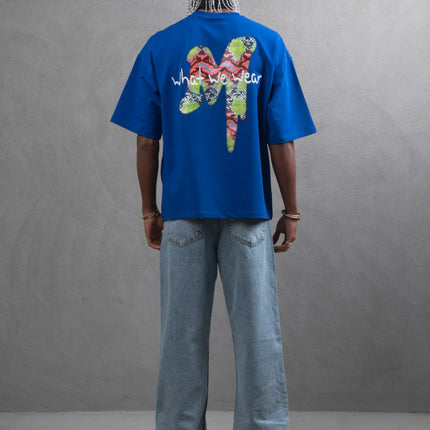 Oversize Graphic Cotton Tee – "What We Wear" Abstract Print