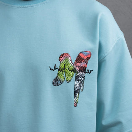 Oversize Graphic Cotton Tee – "What We Wear" Abstract Print