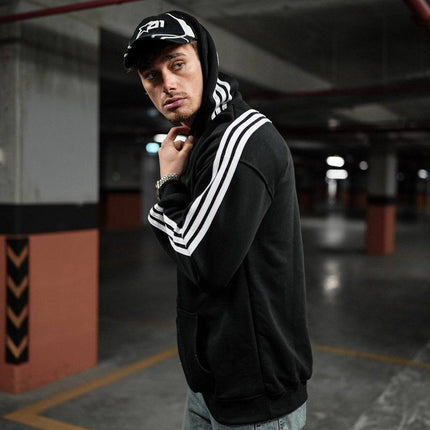 Oversized Hoodie with Striped Sleeve Details - Stylish and Comfortable Design
