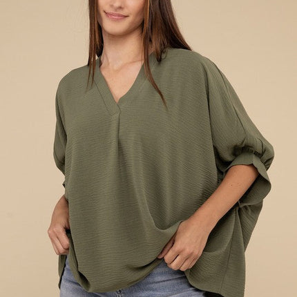 Woven Airflow V-Neck Puff Half Sleeve Top