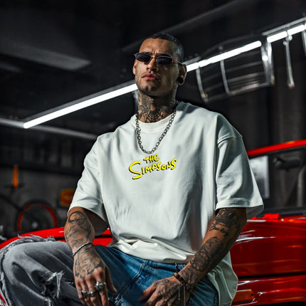 Mischief Icon Men's Graphic Tee – Tattooed Character Streetwear with Attitude